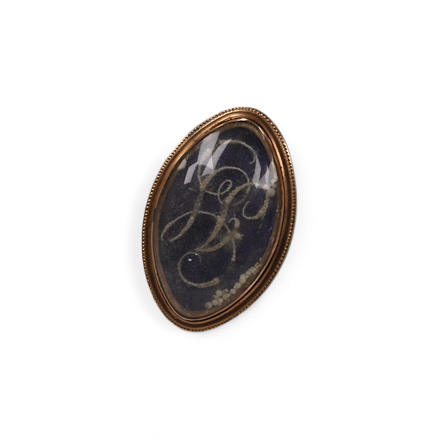 A George III yellow metal, enamel and simulated seed pearl set initialled oval mourning ring, with engraved inscription, 'Isaac Sparks ob. 17th Jan, 1788 ae. 60' size G/H, gross weight 7.6 grams. Condition - poor